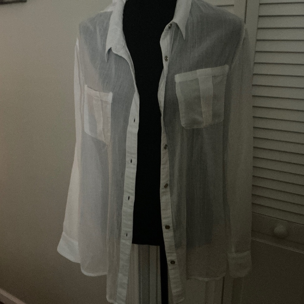 Calvin Klein shirt, white gold buttons worn twice like new.